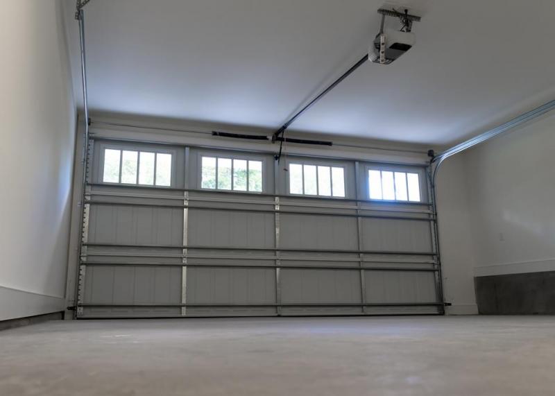 Porte de garage &agrave; Saint-Jean-du-Cardonnay : guide pour bien choisir